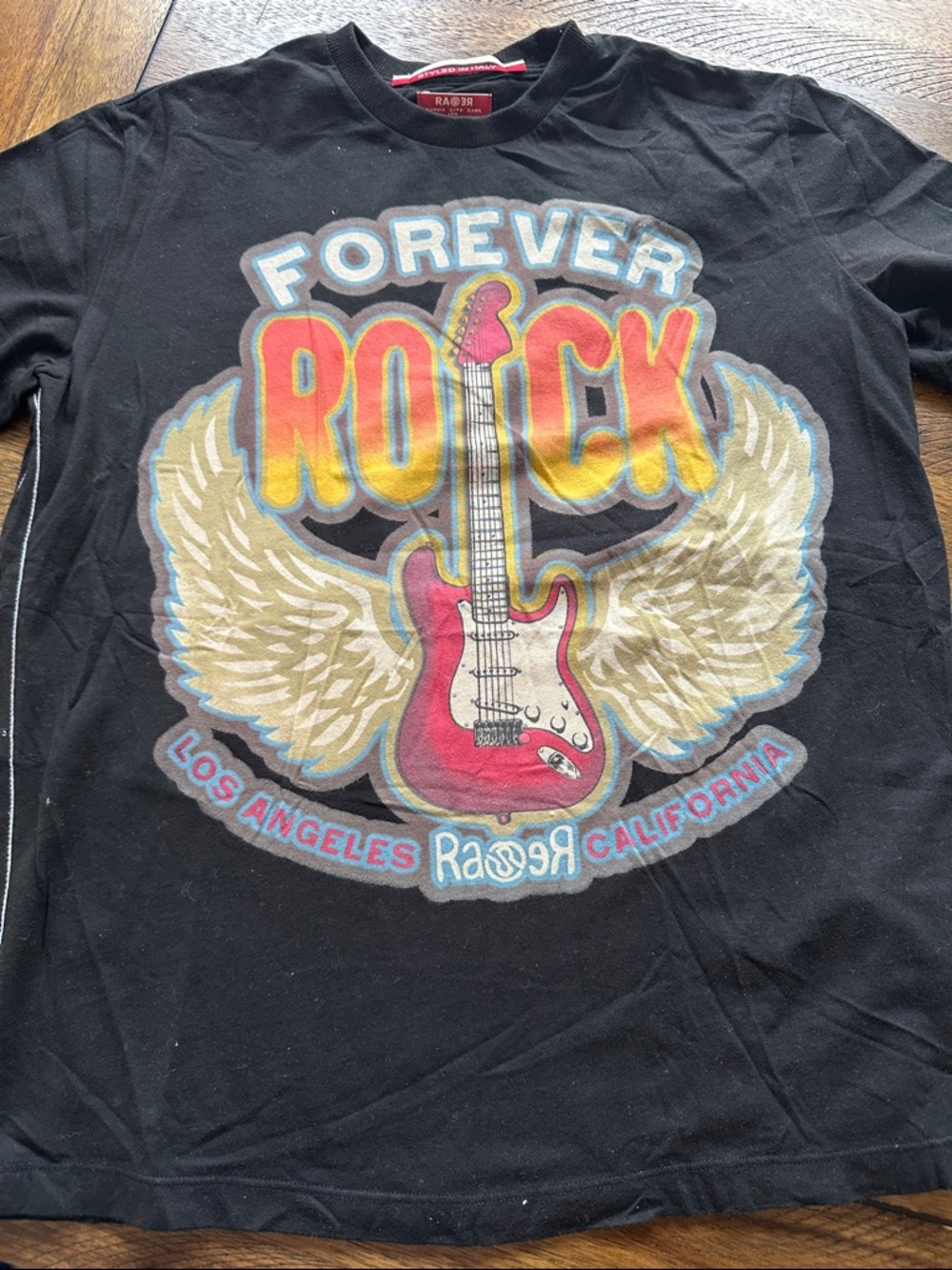 Ras Black Tee with Pink Guitar and Gold Wings